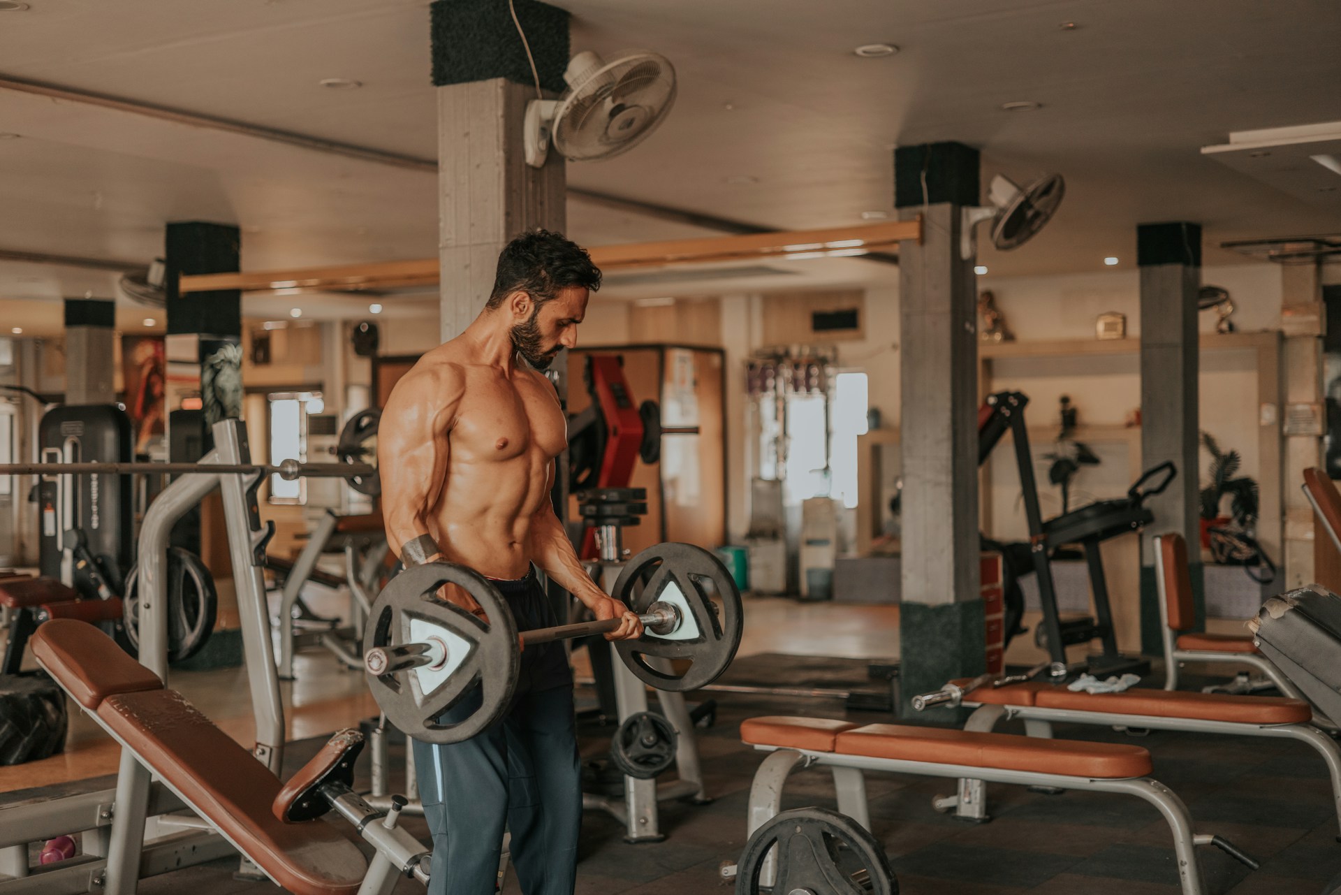 A person sweating heavily during an intense workout, emphasizing the effort and physical activity involved in burning calories.