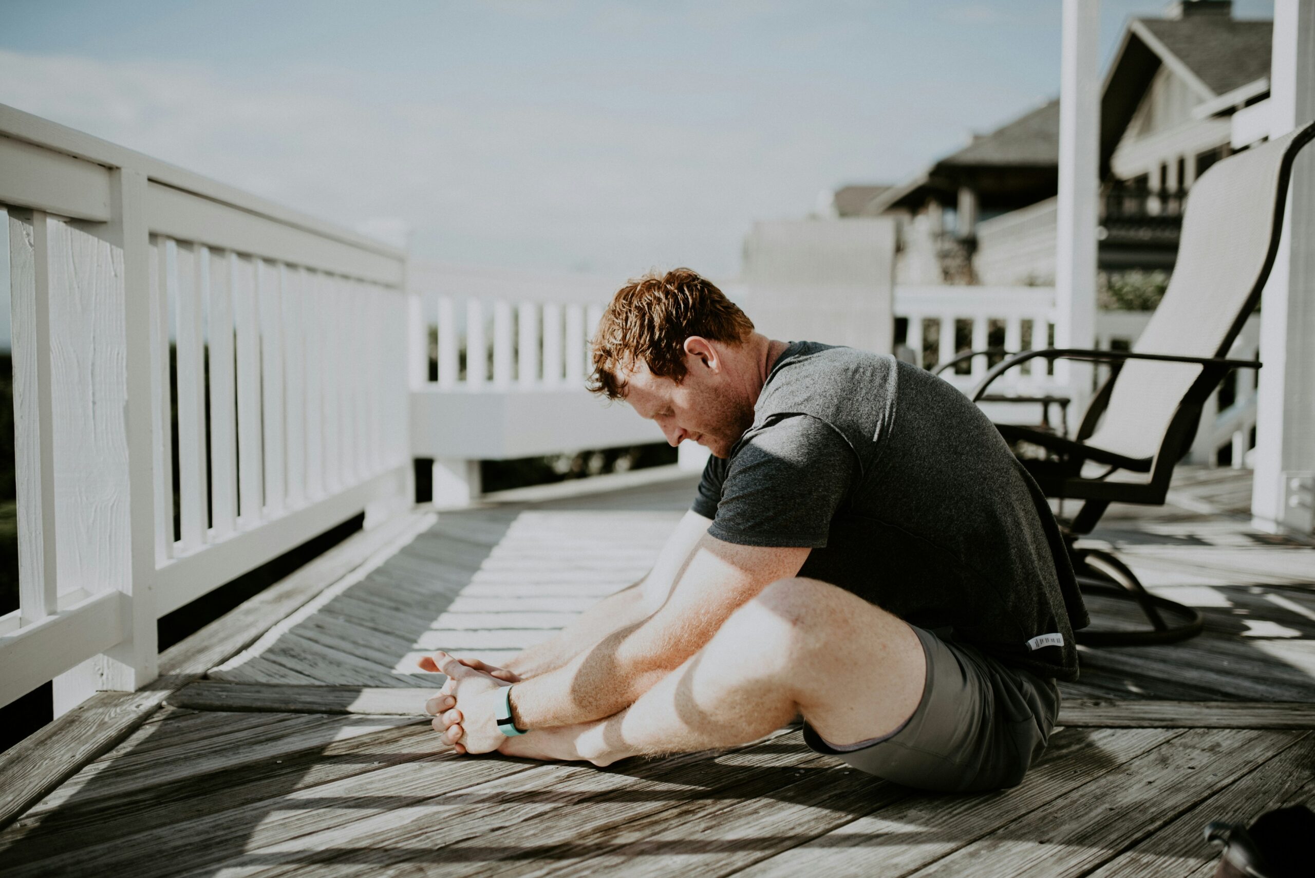 A person performing stretches to alleviate joint pain, highlighting the importance of mobility exercises for joint health